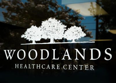 Woodlands sign